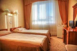 Отель Отель Доминик Донецк Стандартный двухместный номер с 2 отдельными кроватями-4
